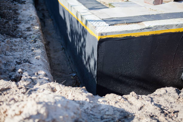 Professional Waterproofing technician working in Plymouth, MN
